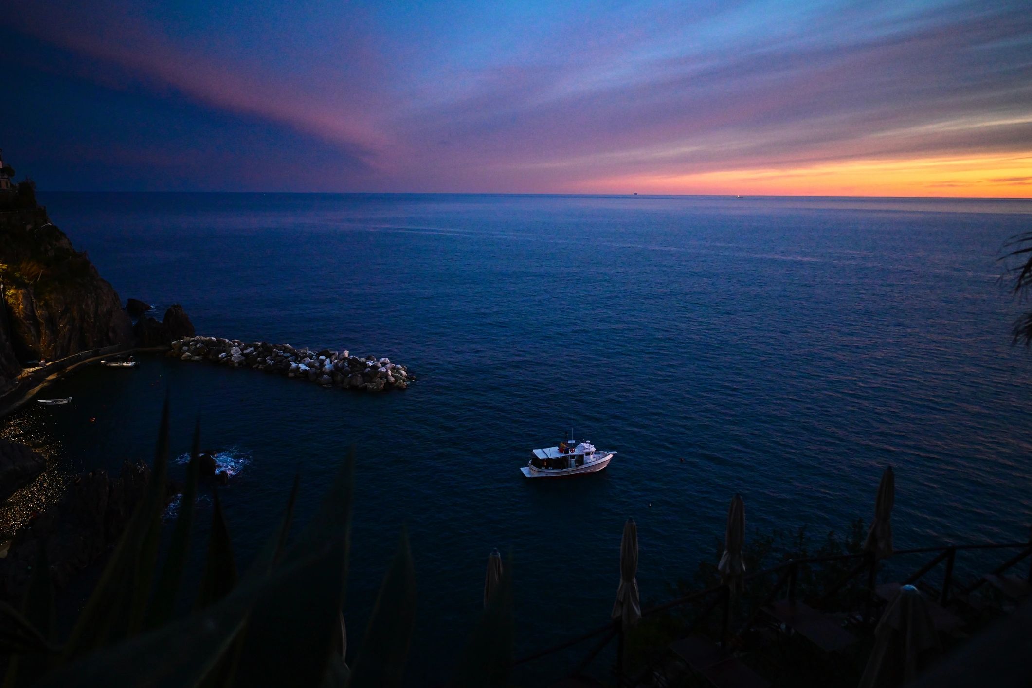 Boat on the water at sunset