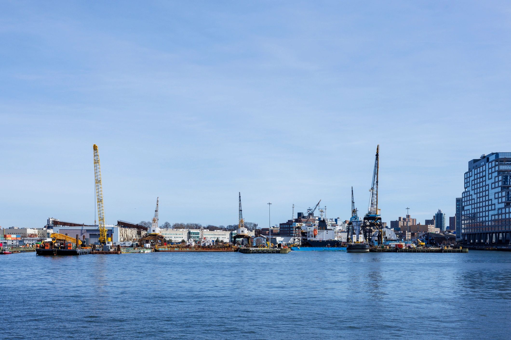 Shipyard with heavy equipment and cranes